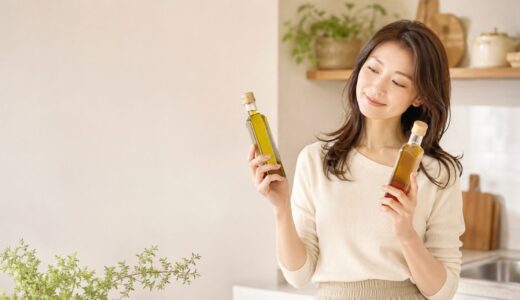 えごま油と亜麻仁油の瓶を両手に持ち、どちらにしようか見比べる女性